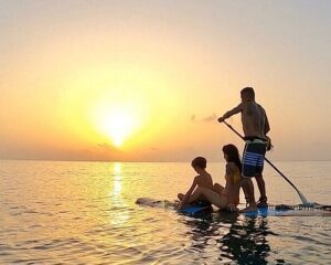 Family Sunset paddle board Playa del Carmen